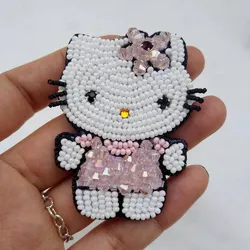 Hello kitty из бисера сережки