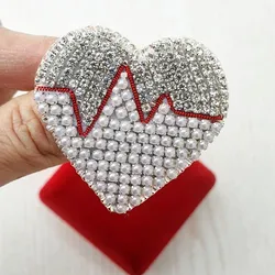 Кольцо из бисера в форме сердечка