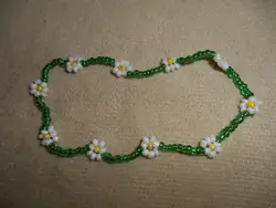 Фото ожерелья из бисера с ромашками